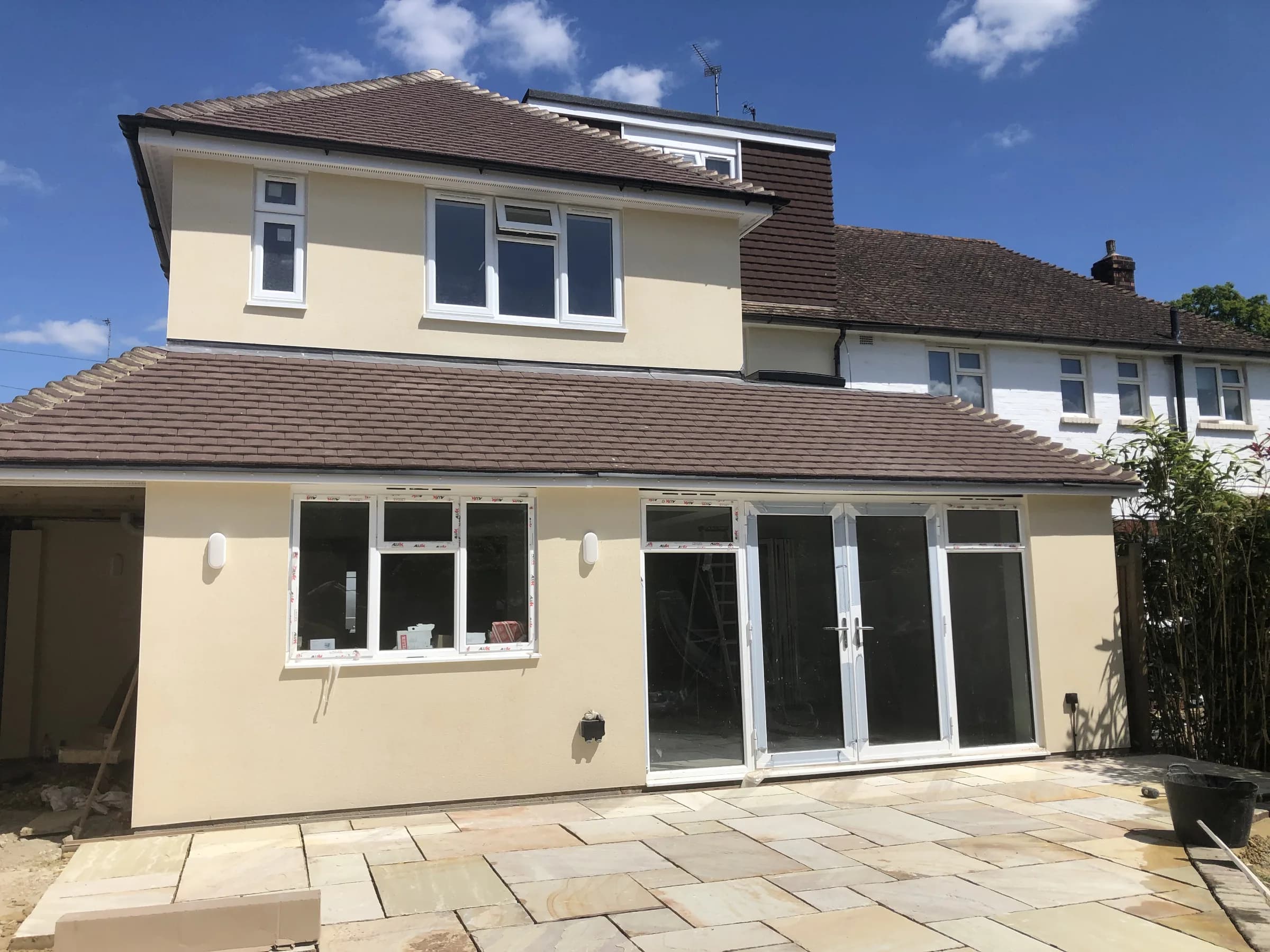 Two-storey rear extension with rendered finish