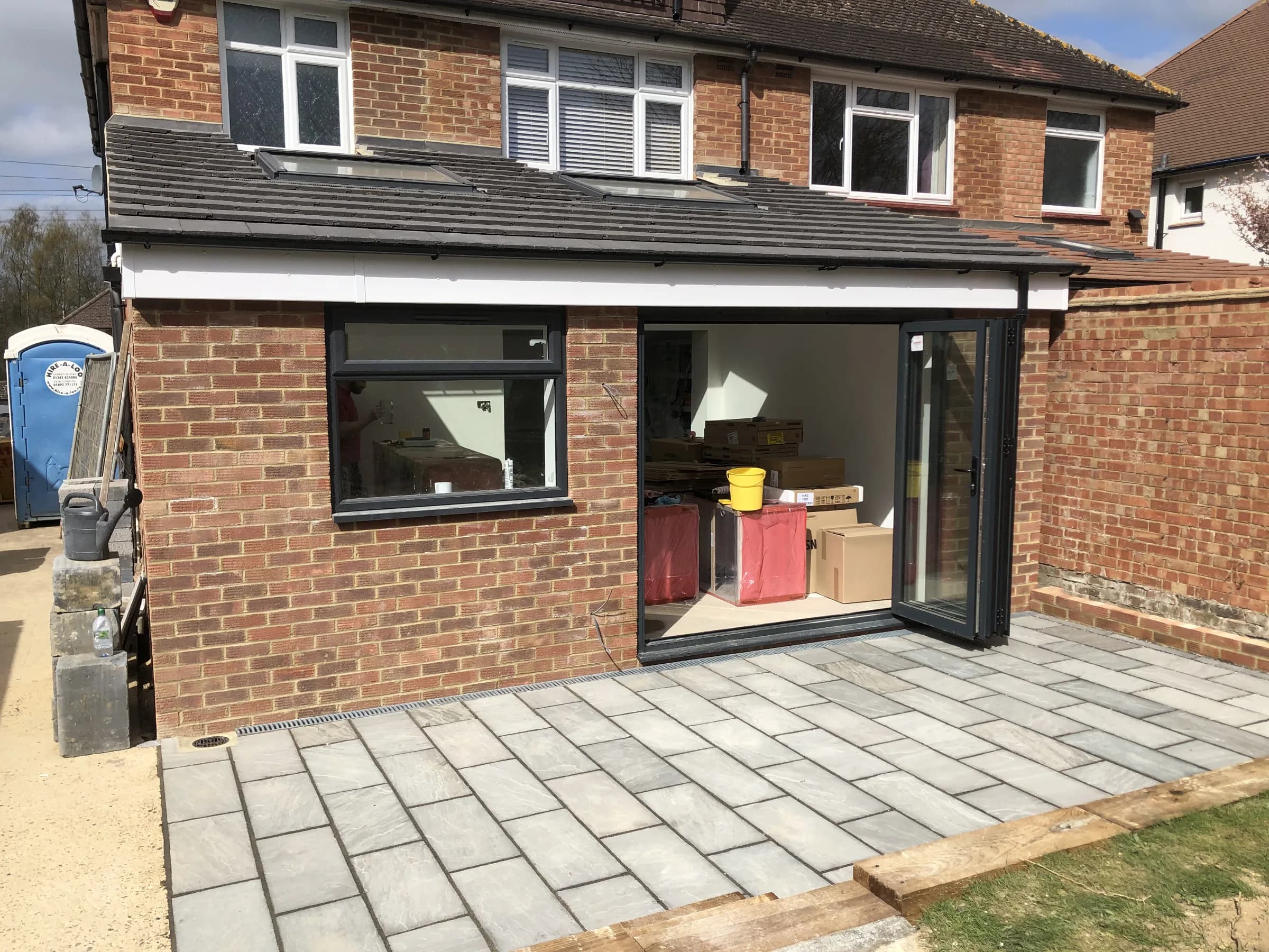 Single storey rear extension with bi-fold doors and patio