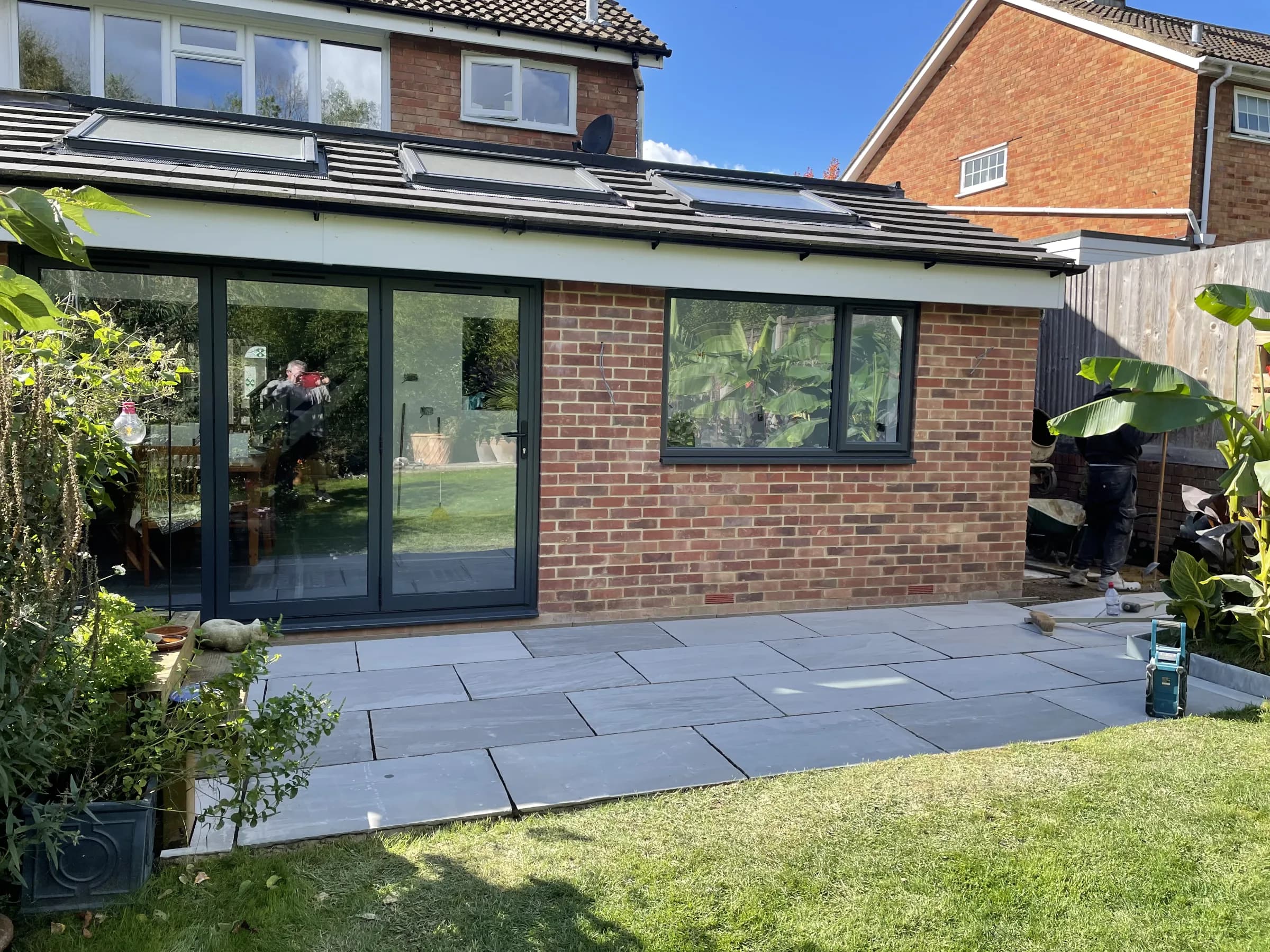 Single-storey rear extension with bi-fold doors and new patio