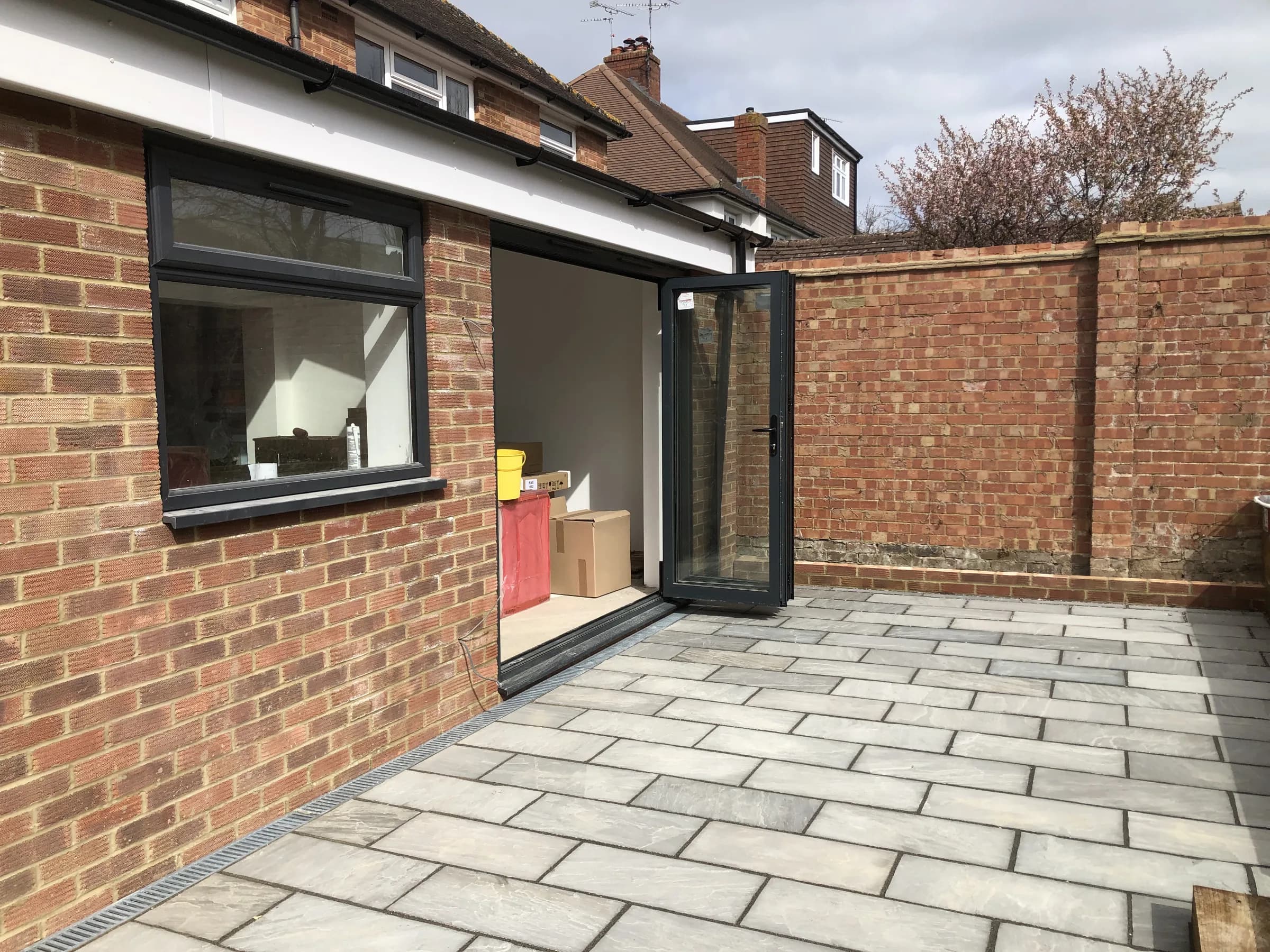 Single storey rear extension with bi-fold doors and patio, photo 2